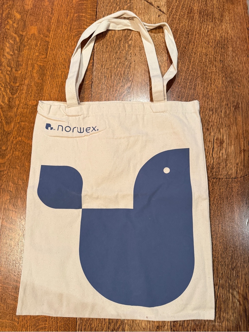 Norwex Cream Tote with Navy Graphic Bird